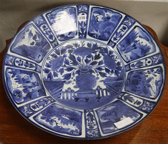 A Japanese arita blue and white charger, circa 1700, restored,